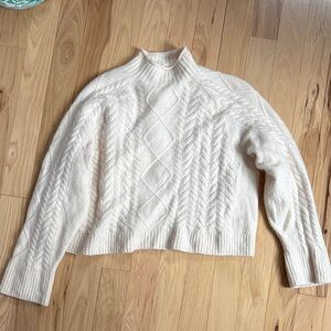 Cable-knit Rollneck™ sweater in Supersoft yarn